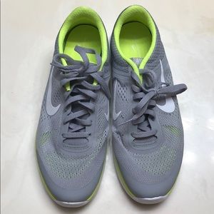 Gray, what, and lime green Nike’s!